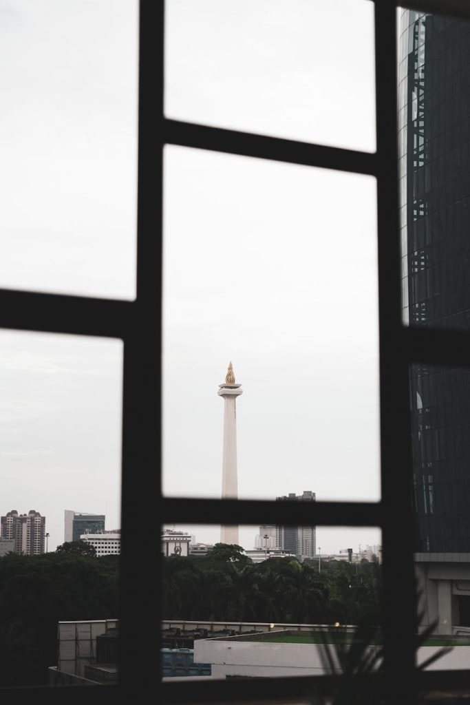 national monument in jakarta cityscape view